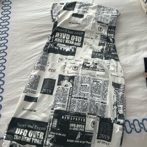 Adika newspaper dress strapless